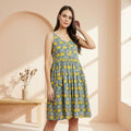 Side view of Pretty Elephant Print Midi Dress, illustrating the a-line design perfect for casual or festive wear.